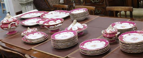 A late 19th/early 20th century large dinner service, bordered and gilded